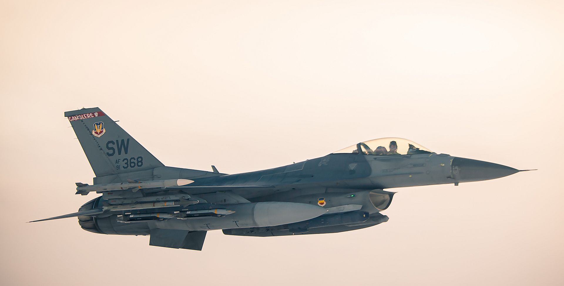 F 16 Fighting Falcon Pilot Assigned To The 77th Expeditionary Fighter Squadron Flies Alongside A KC 135R Stratotanker 