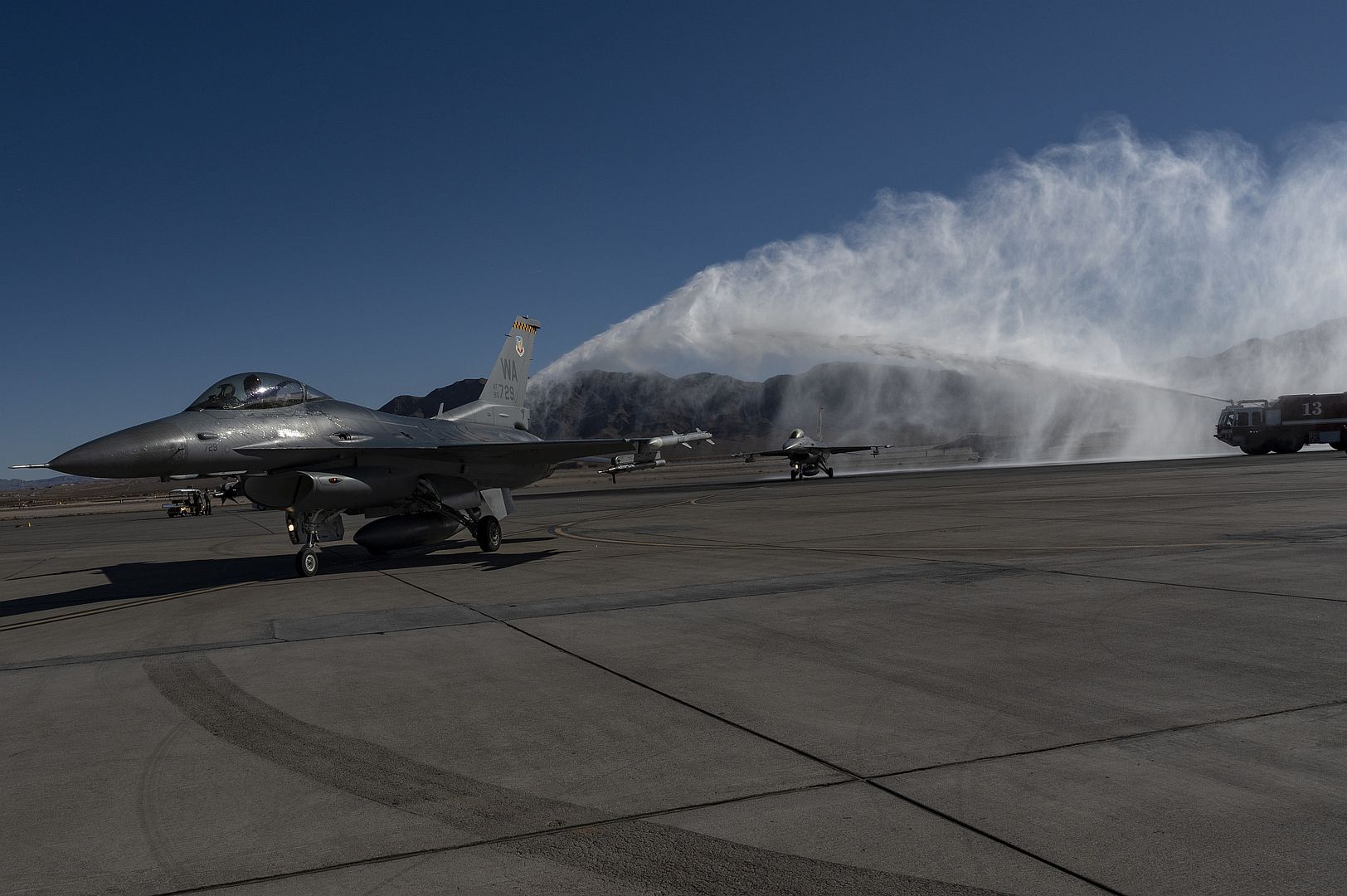 F 16 Fighting Falcons Navigated By Airmen Assigned To The 24th Tactical Air Support Squadron Taxi In After Their Fini Flight Prior To The Inactivation Ceremony Of The 24th TASS At Nellis Air Force Base