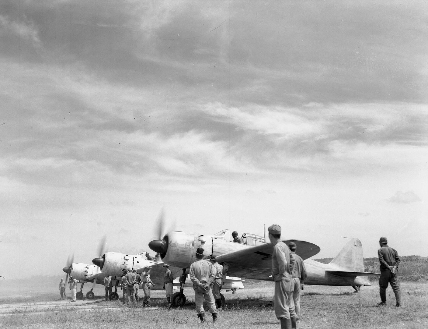 Japanese Mitsubishi A6M5 Reisen Zero Fighters With Their Engines Running About To Fly To Jacquinot Bay