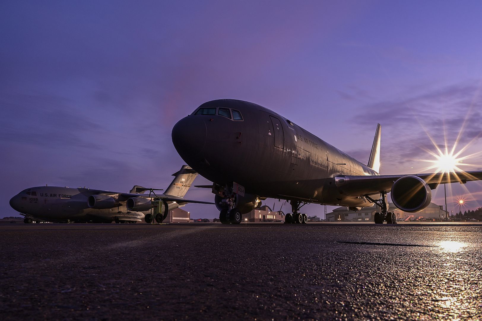 KC 46A Pegasus Assigned To The 916th Air Refueling Wing Sits Next To C 17 Globemaster III