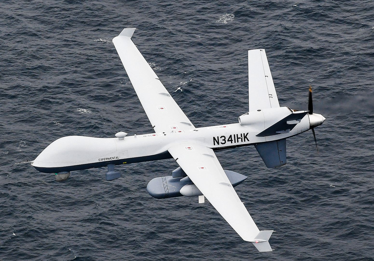 9 Sea Guardian Unmanned Maritime Surveillance Aircraft System Flies Over The Pacific Ocean