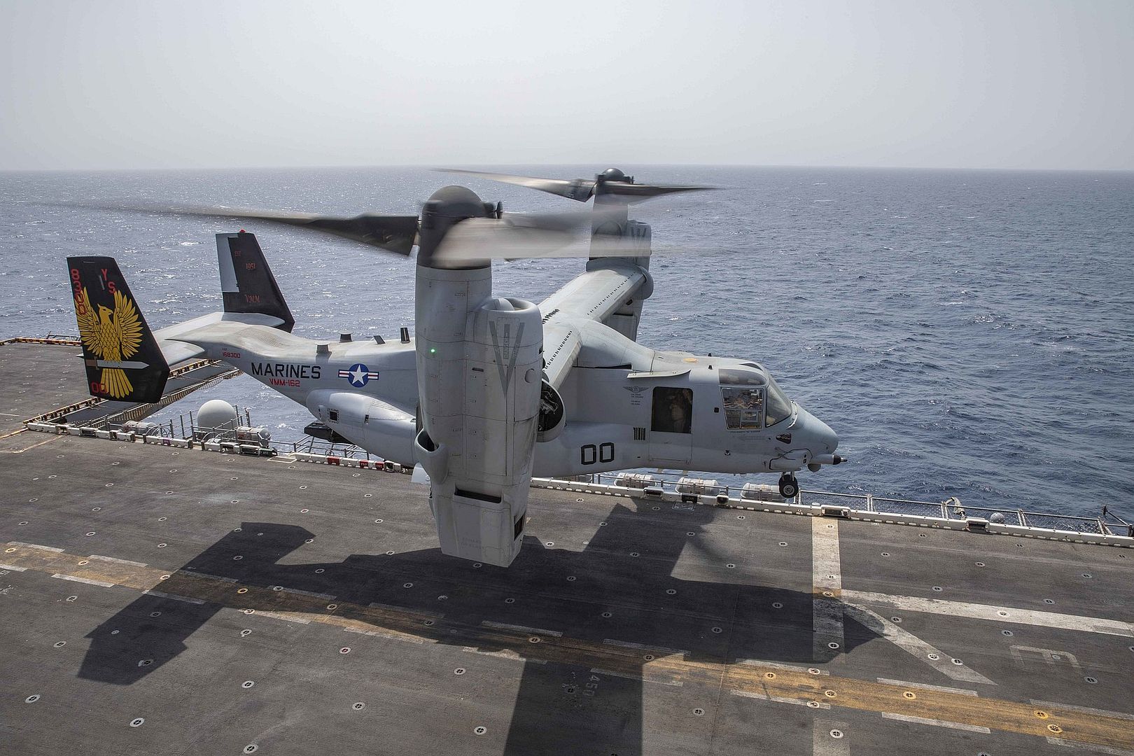 22B Osprey Tiltrotor Aircraft Attached To Marine Medium Tiltrotor Squadron 162 Takes Off From The Flight Deck Of Amphibious Assault Ship USS Iwo Jima