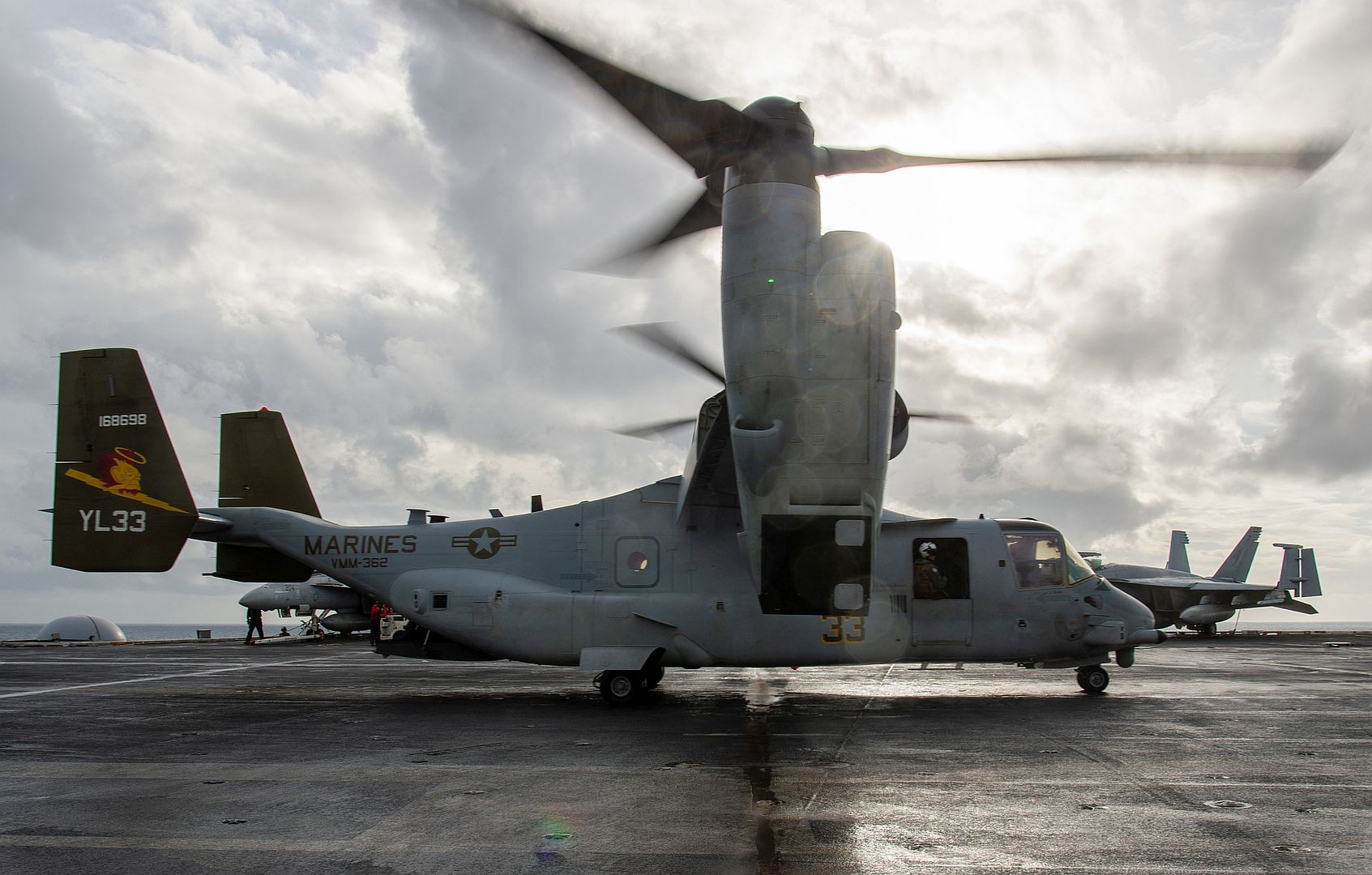 22 Osprey From The Ugly Angels Of Marine Medium Tiltrotor Squadron 362 Taxis On The Aircraft Carrier USS Nimitz