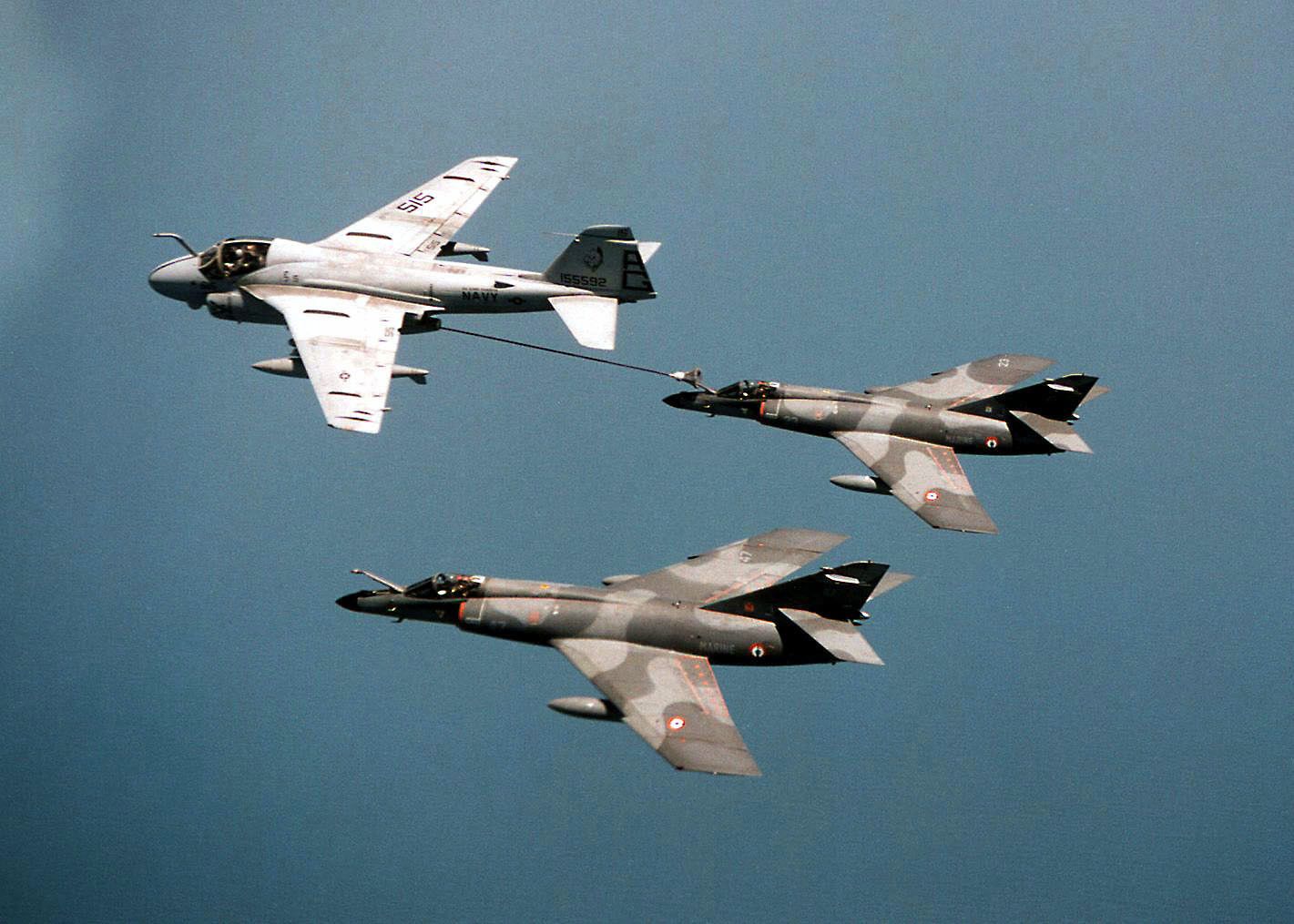One USN A 6E Intruder VA 34 Blue Blaster Attack Squadron Refuels A French Navy Dassault Super Etendard Fighter Bomber