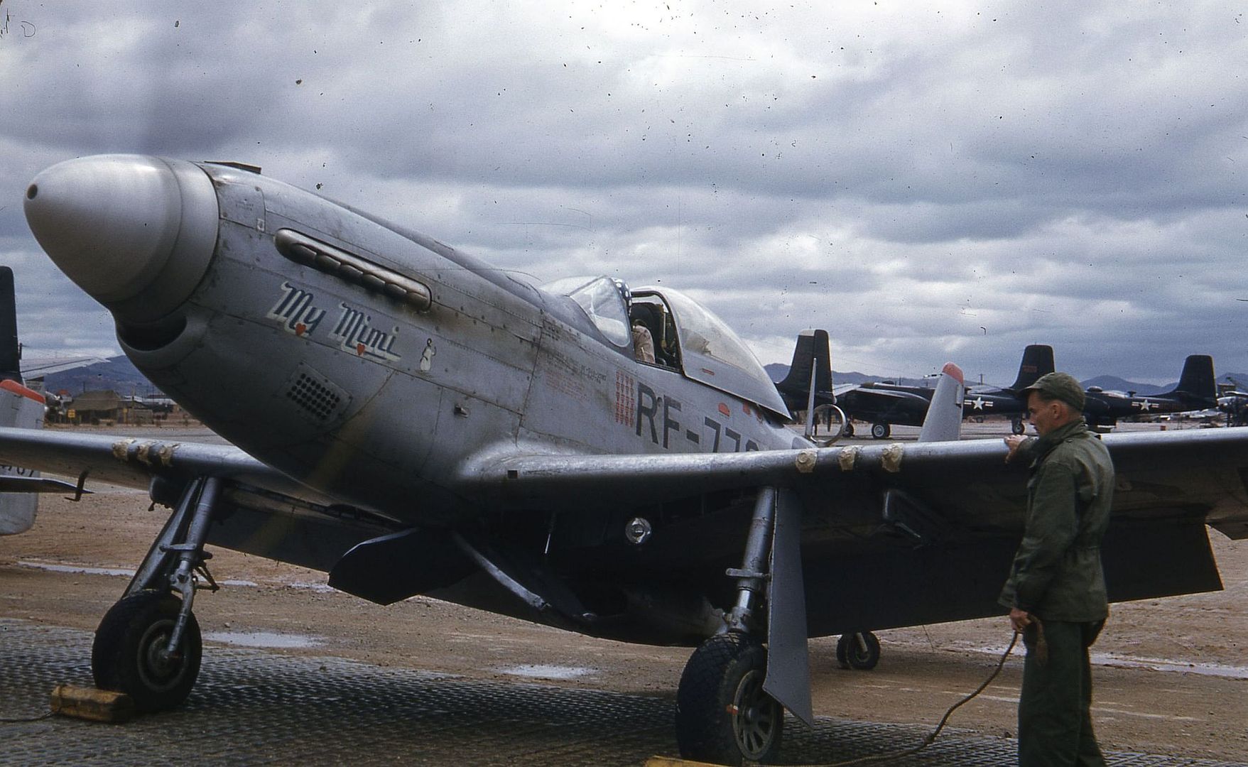 One Half Left Front View Of A North American RF 51D Mustang My Mimi Sn 44 84778 Cn 44634 Parked On The Hardstand Somewhere In Korea