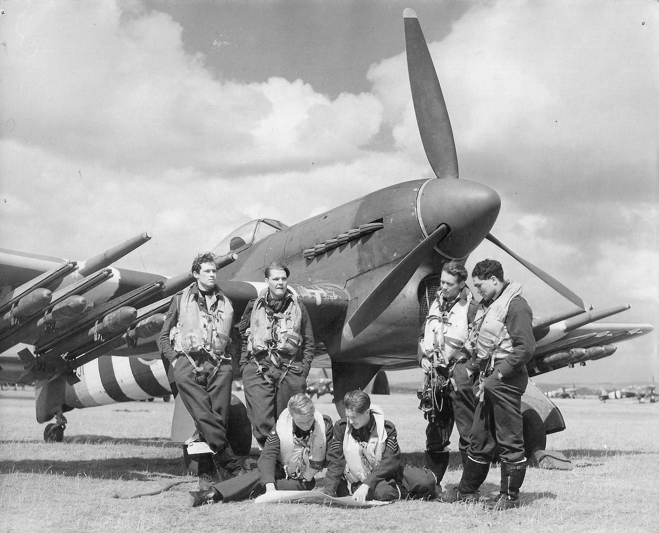 Pilots Of 198 Squadron RAF Next To Hawker Typhoon On Thorney Island England 1944