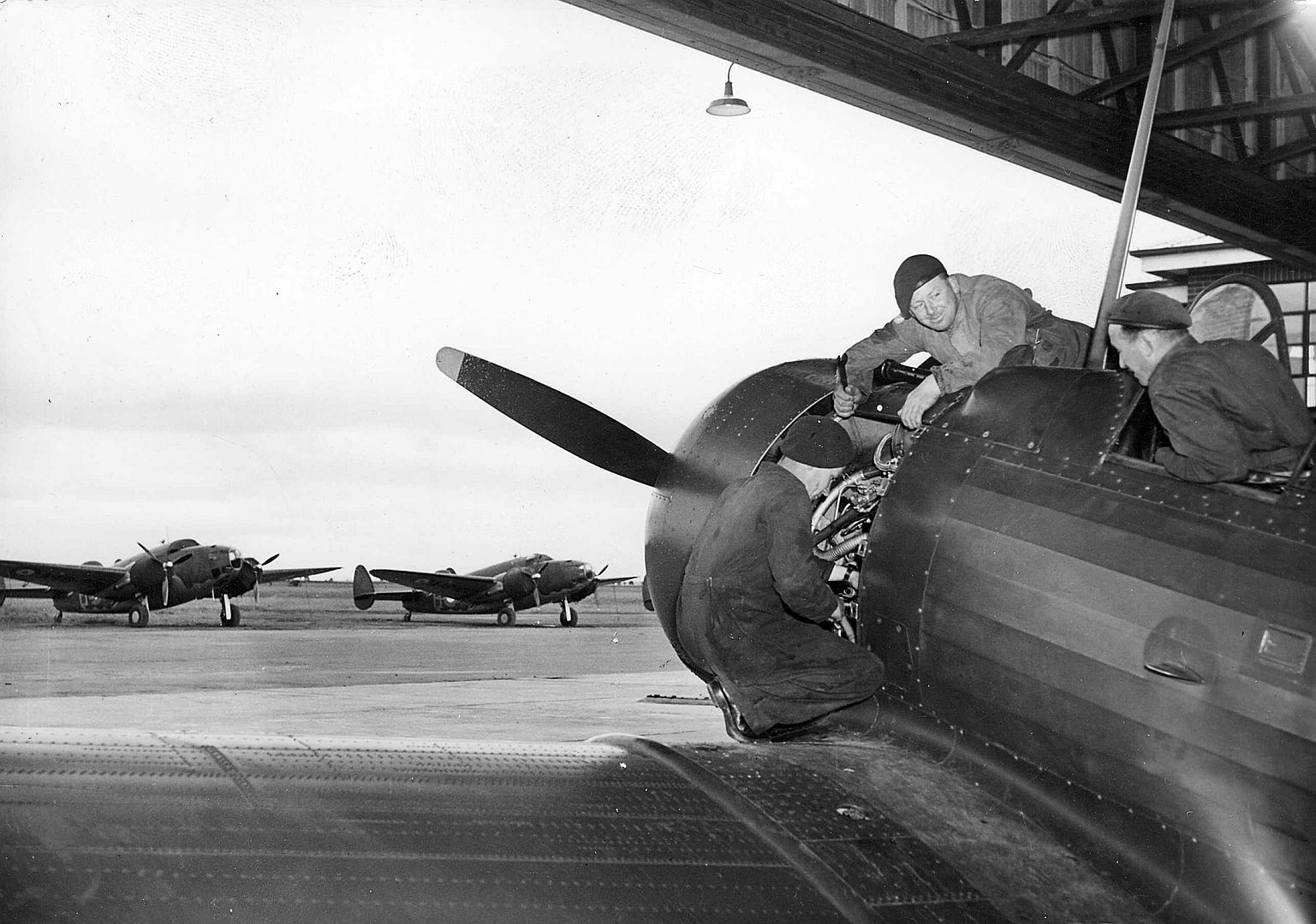  Ground Staff Checking A Wirraway Being Used In Battle For Melbourne