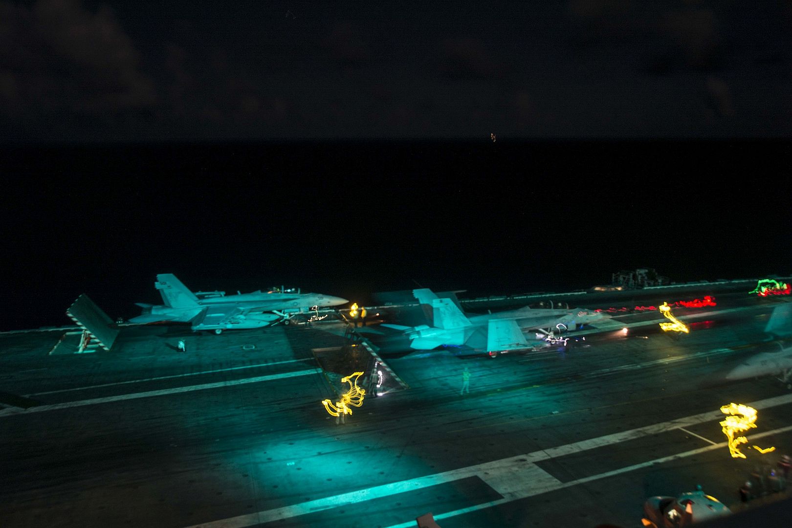 Sailors Perform Night Operations On The Flight Deck Of The Navy S Only Forward Deployed Aircraft Carrier USS Ronald Reagan