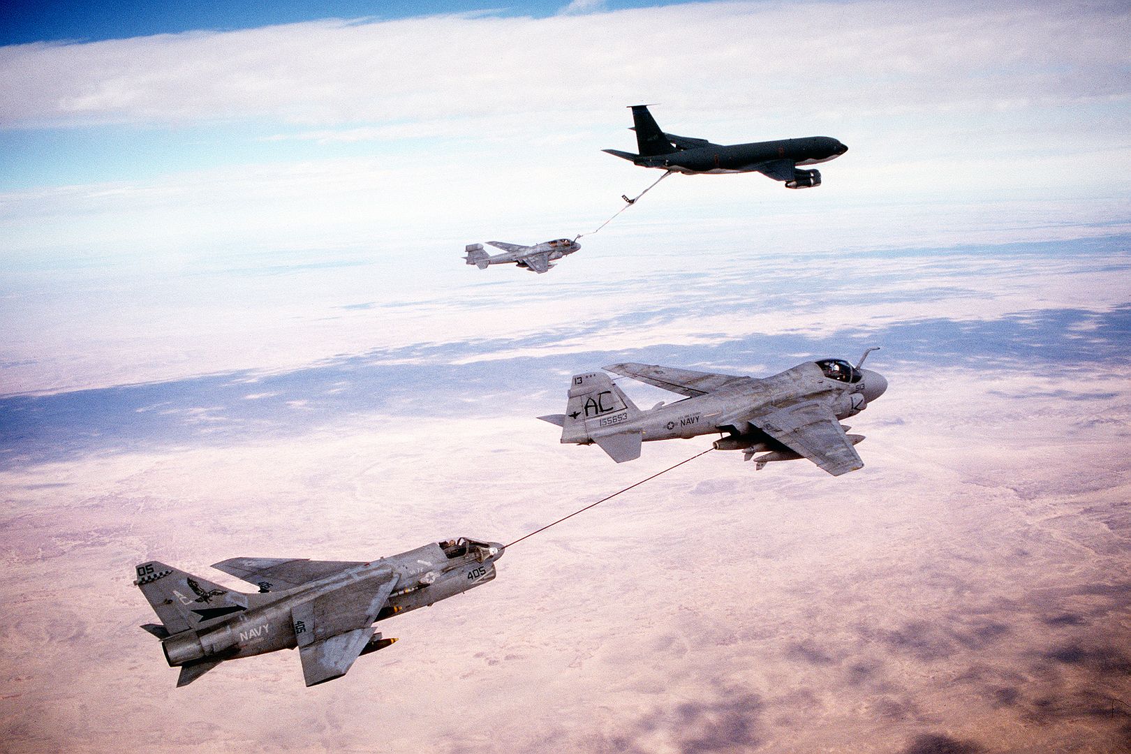 While En Route To Targets In Iraq During Operation Desert Storm An Attack Squadron 72 A 7E Corsair Aircraft Is Refueled By An Attack Squadron 75 A 6E Intruder