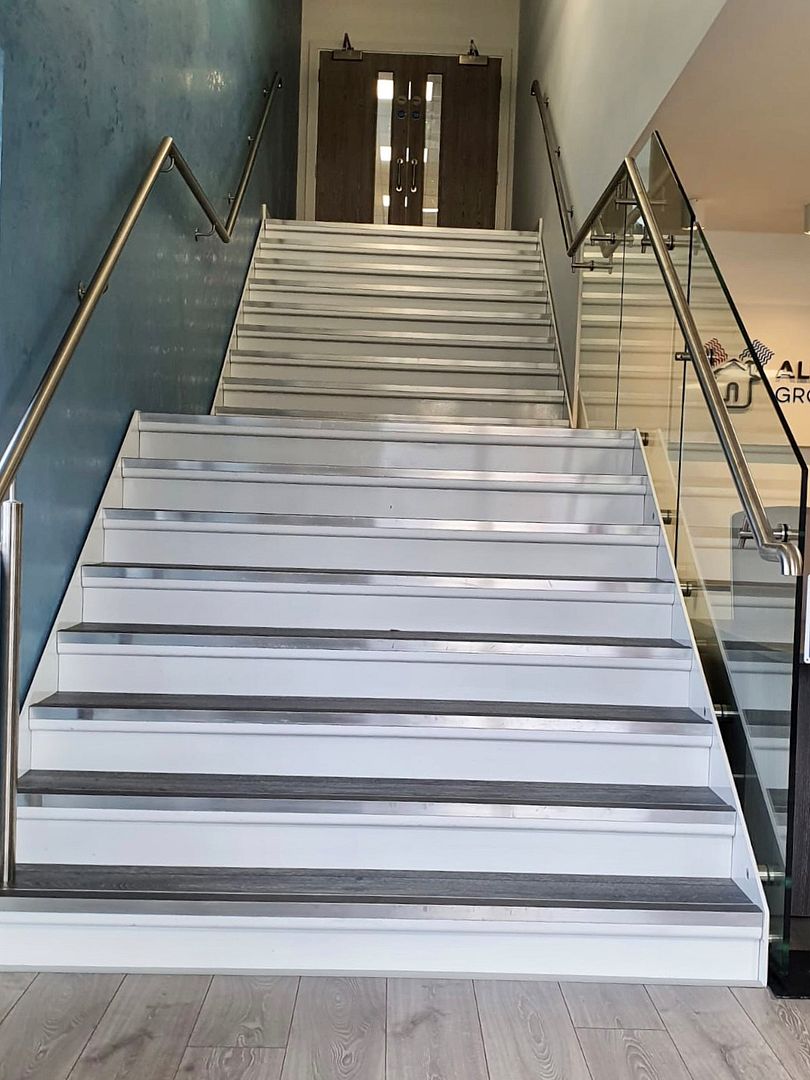 powdercoated steel staircase frameless glass balustrade