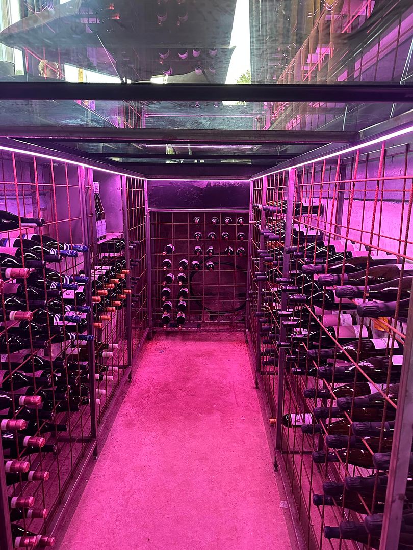 led-lit-wine-cellar-glass-hatch-norway