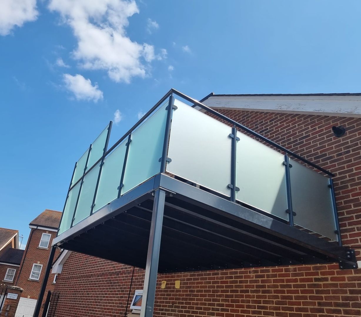 large-walkout-balcony-surrey-glass-privacy-screen