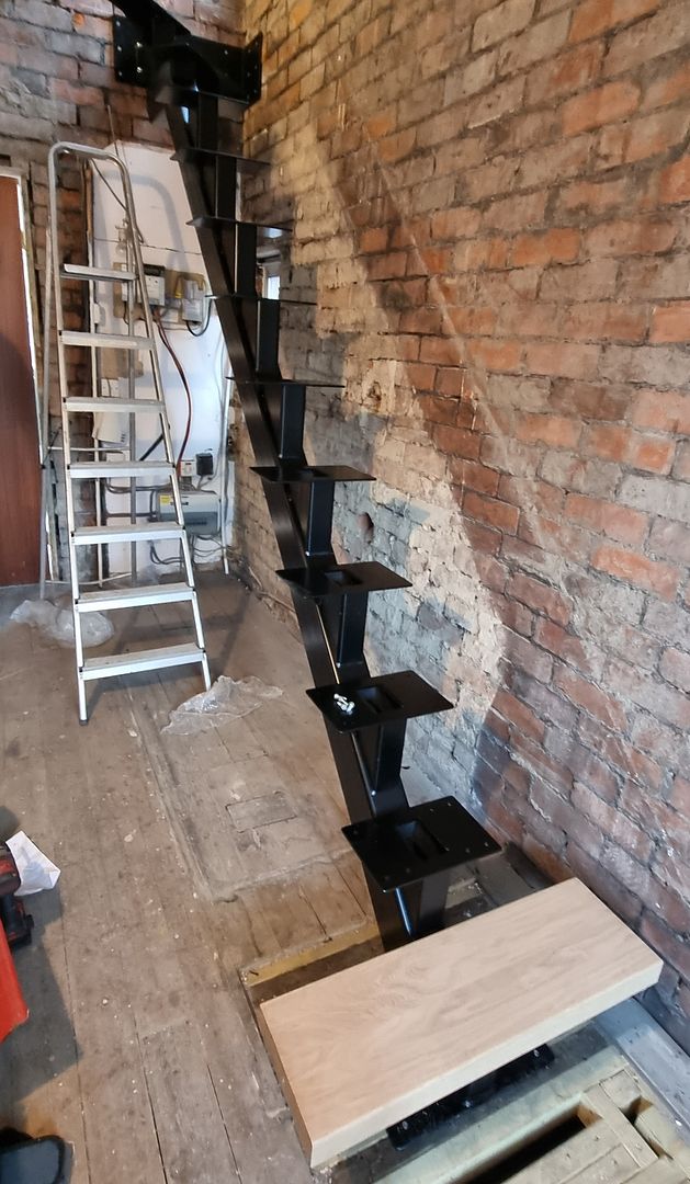 installing-steel-spine-staircase
