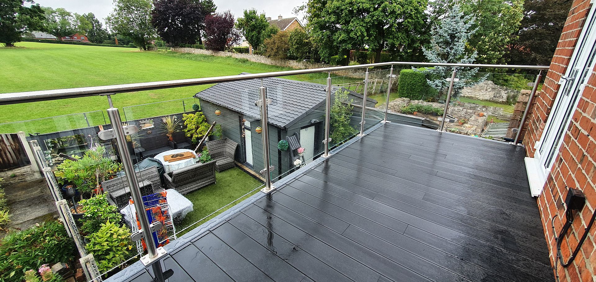walk out balcony structure with glass balustrade