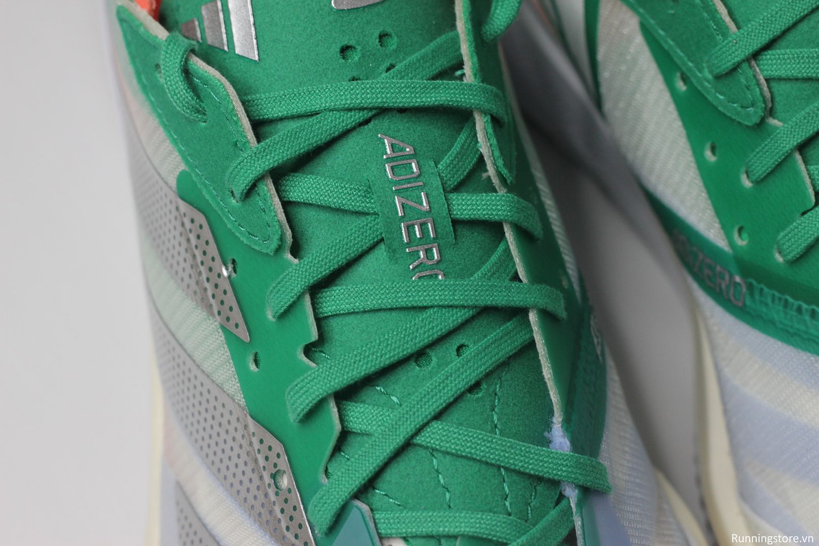 Giày chạy bộ Adidas Adios 7 màu trắng xanh lá HQ3699