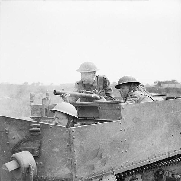 A_Universal_Carrier_crew_of_the_2nd_Sherwood_Foresters_fire_a_2-inch_mortar_from_their_vehicle_in_the_Anzio_bridgehead_Italy_April_1944._NA13646.jpg