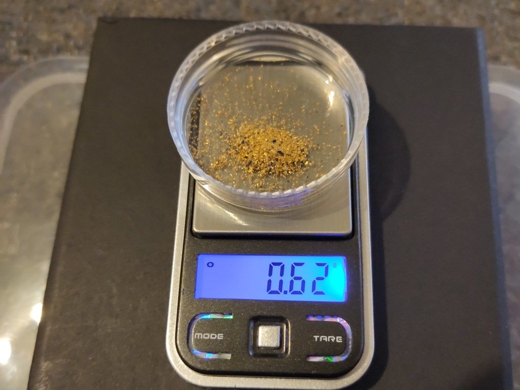 0.62 grams of gold weighed on a set of digital scales