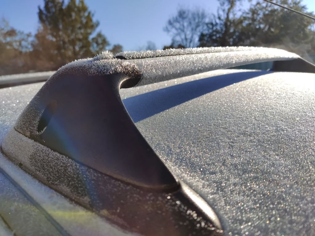 Closeup of early morning frost on a car