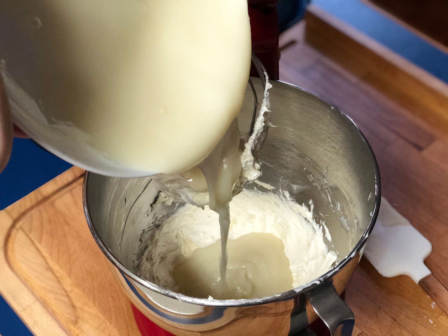 adding the roux to the whipped butter