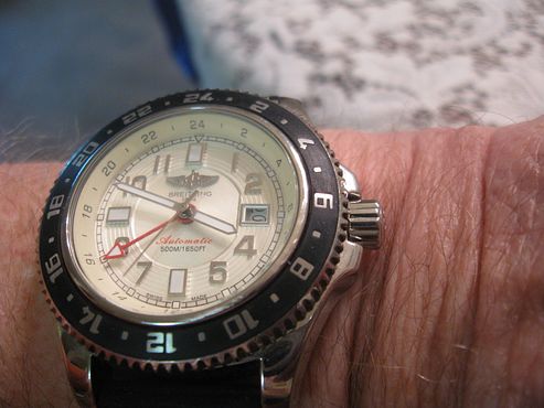 BREITLING_GMT._W._WHITE_DIAL._ON_BLK._RU