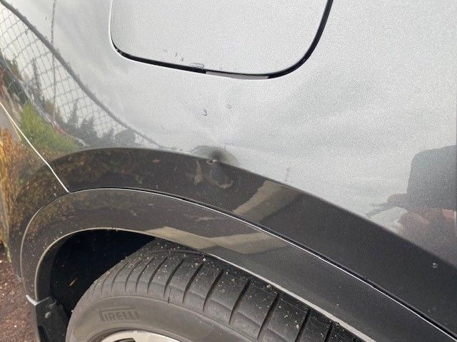 SQ5_Rear_Quarter_Door_Ding_1.jpg